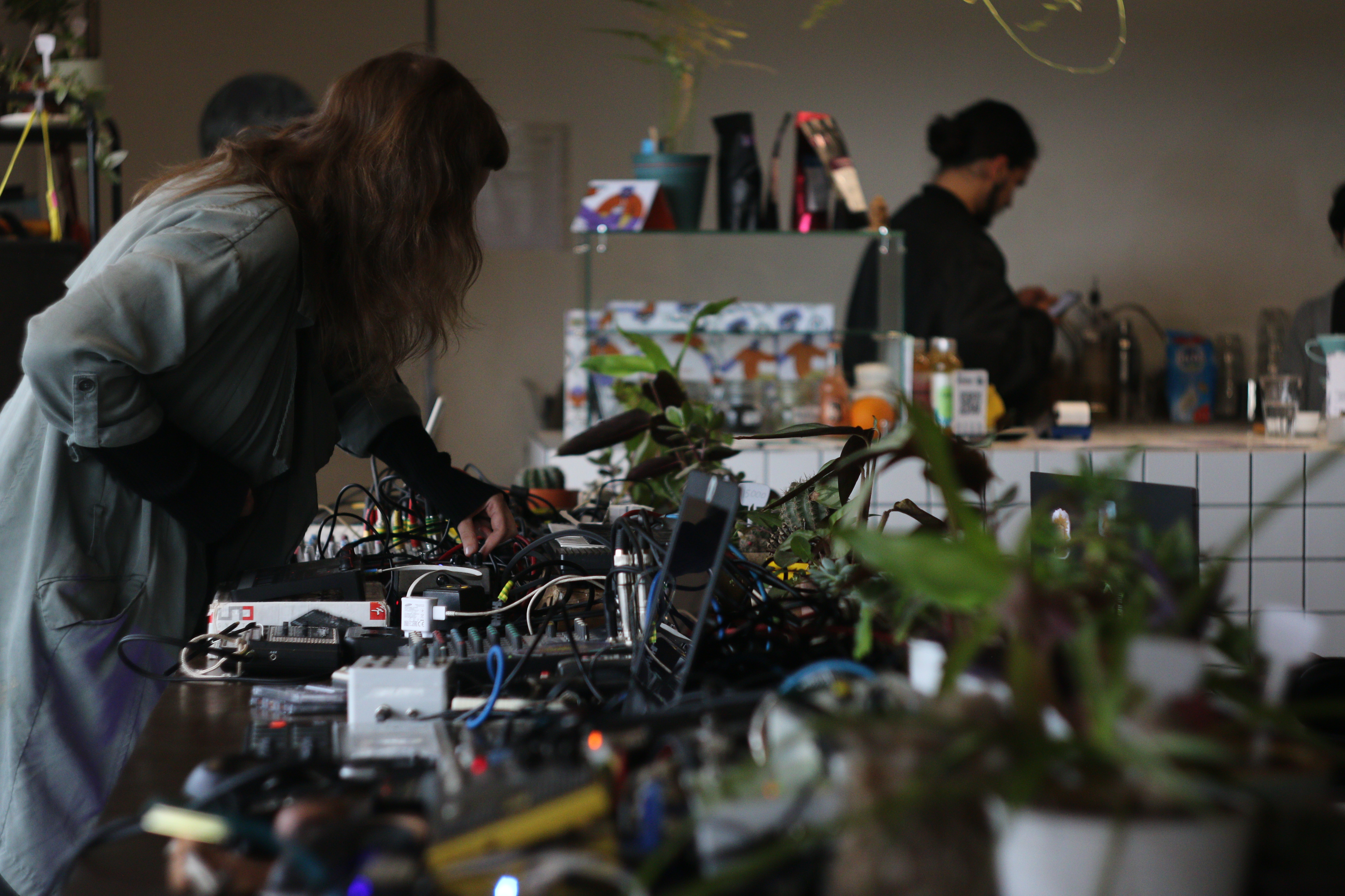 Drone Day table with electronic equipment and plants
